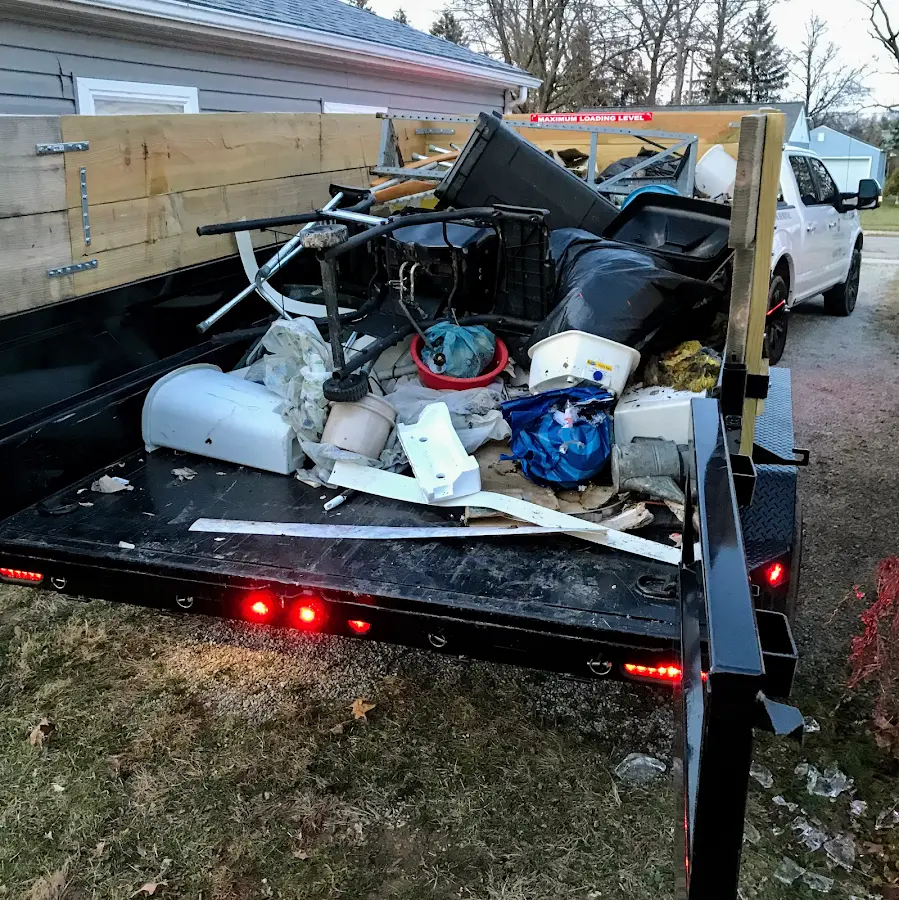 Roll-off dumpster delivered to a residential driveway in Valdosta